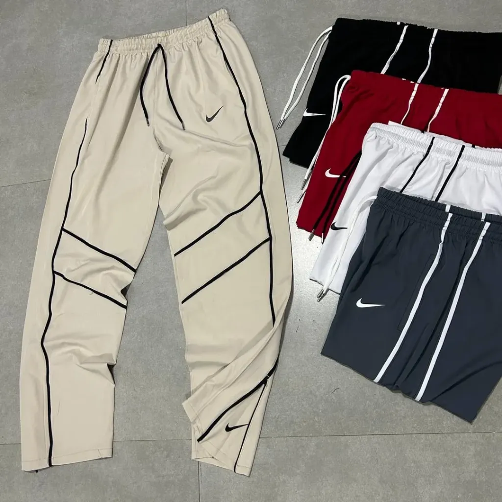 (DOCENA) TRACK PANTS LINEA CRUZADA (NIKE)