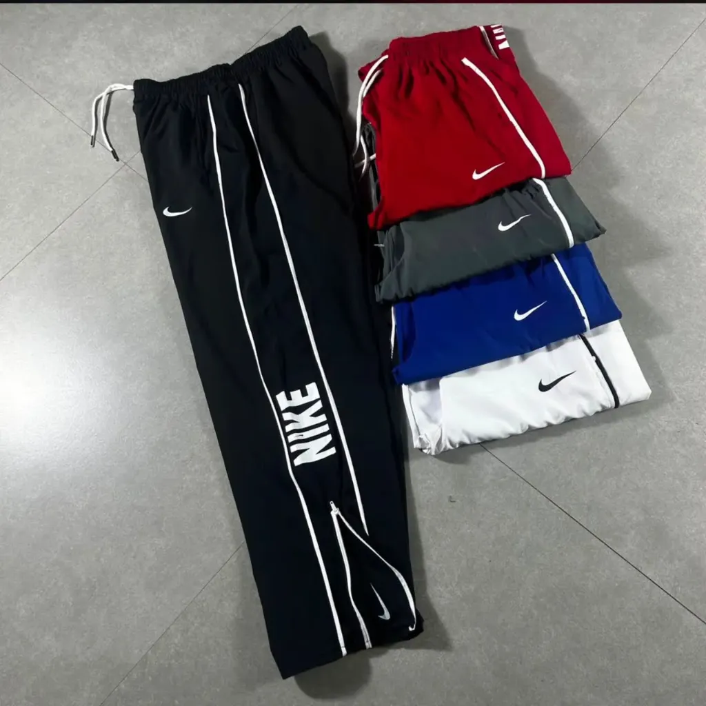 (DOCENA) TRACK PANTS LETRA (NIKE)